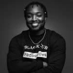 Portrait of Mylz Blake in a sweatshirt that says "Blackcub Productions"