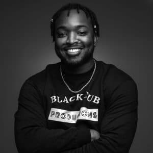 Portrait of Mylz Blake in a sweatshirt that says "Blackcub Productions"