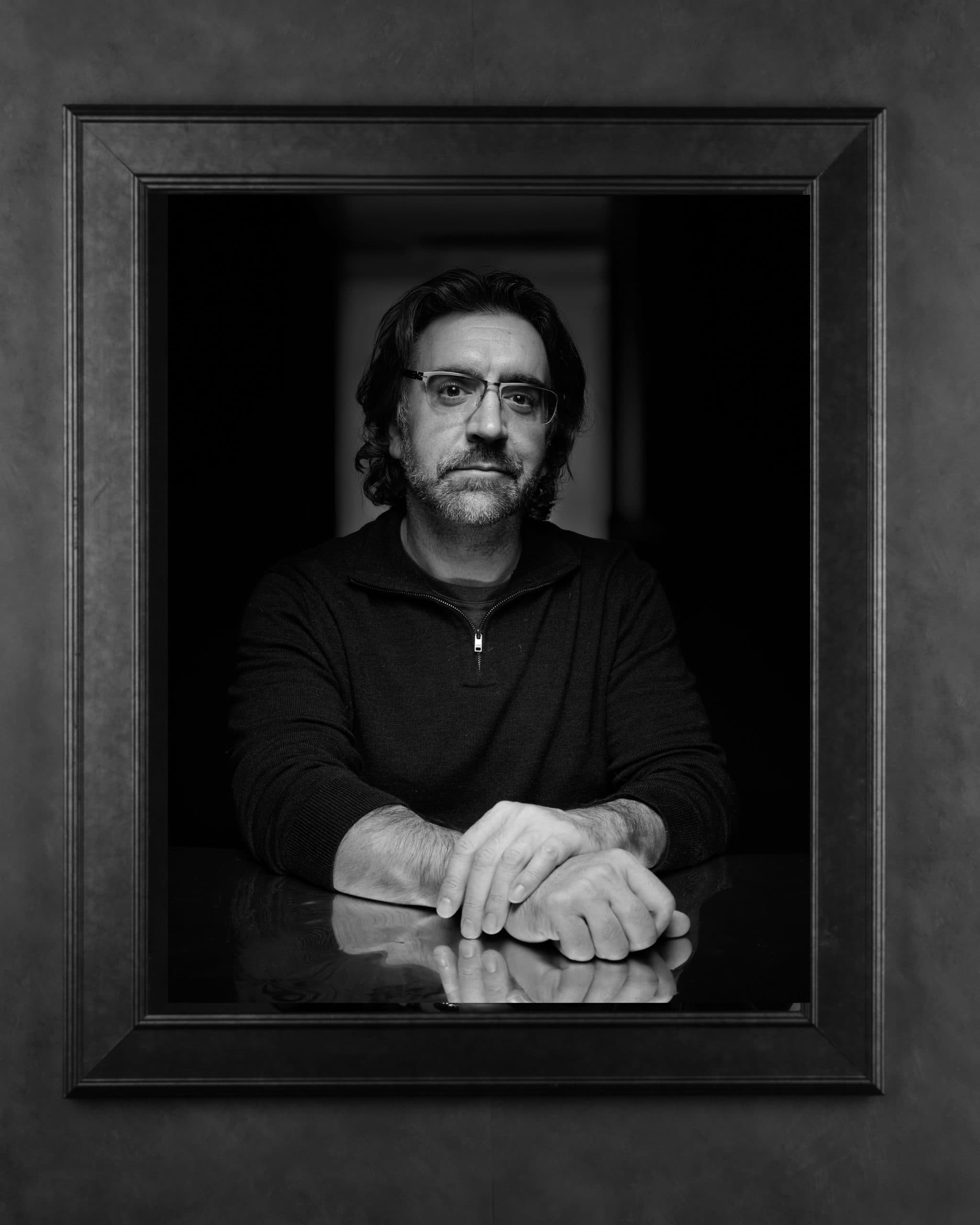 Black and white portrait of a man.