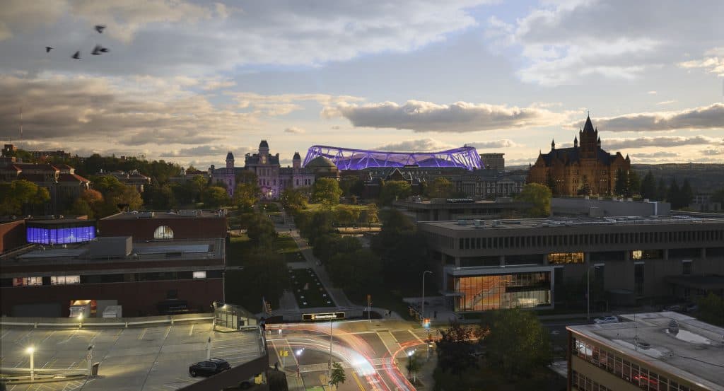 Horizontal scenic photo of Syracuse campus with cloudy blue sky