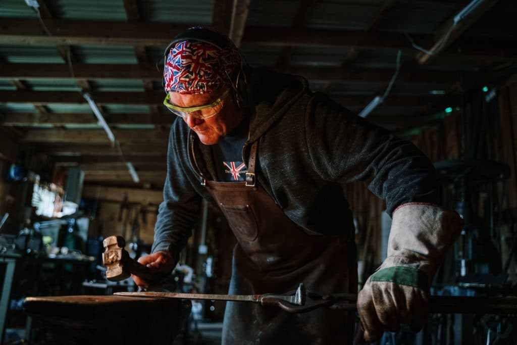 A man works in a workshop.